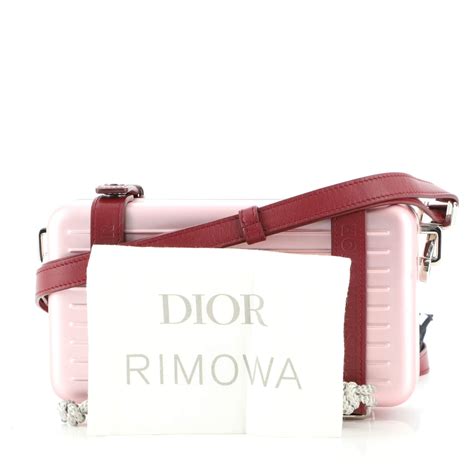 dior rimowa personal clutch price|christian Dior aluminum clutch.